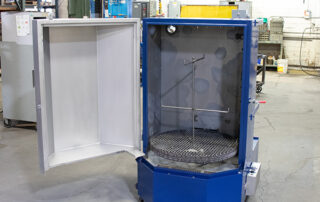 Inside view of an economy cabinet washer.