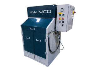 Compact barrel tumbling machine built by ALMCO.
