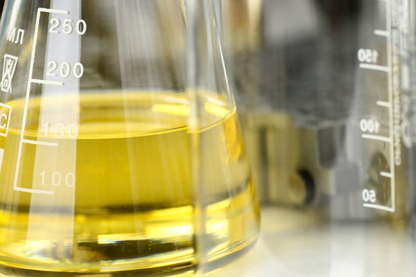 Industrial liquid compound in a glass beaker.